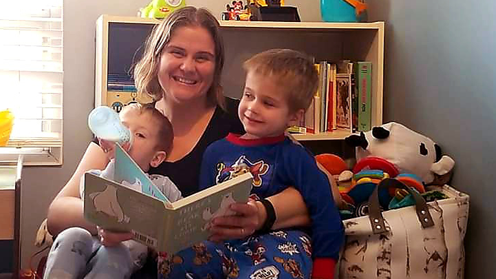 The Abbenhuis family crowns each evening by reading with their children. Shown, from left to right, Renly, mom Avalon and Ryker. Photo Credit: Abbenhuis Family